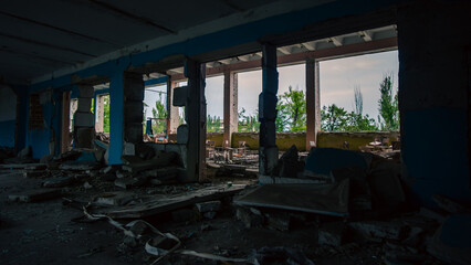 Fototapeta premium destroyed and burned houses in the city in Ukraine