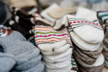 Colorful warm knitted socks sold on Easter market in Vilnius. Annual fair held in March on the streets of capital of Lithuania.