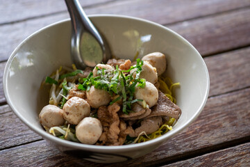 meat ball on top noodles