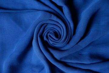 Cobalt blue color viscose fabric texture seamless with beautiful closeup detail fabric. Luxury viscose textile pattern with soft and delicate material.