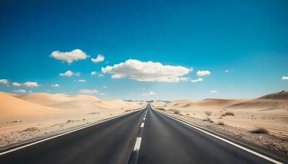 Desert highway with a road that stretches far into the horizon under a blue sky with clouds