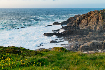 Rough and rocky shore at Malin Head, Ireland's northernmost point, Wild Atlantic Way, spectacular coastal route. Numerous Discovery Points. Co. Donegal