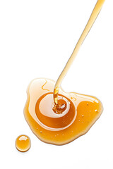 Honey or liquid syrup dripping isolated on white background.