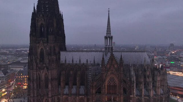 Christmas market near to Cologne Cathedral, evening Weihnachtsmarkt, Koelner Dom in Cologne, Germany, Aerial Winter Shot
