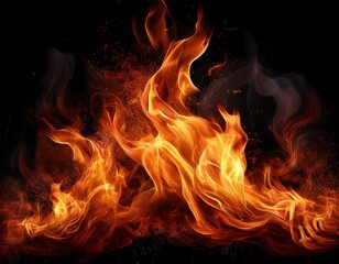 Fototapeta premium bright orange flames dancing against a dark black background. The fire is dynamic and fluid, with wisps and curls of heat creating intricate patterns. 