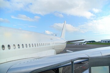 Large aircraft, A350, seen from the boarding bridge