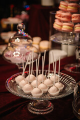 Lollipops. Delicious reception for birthday party or baptism. Table with sweets, candies, and dessert. Wedding candy bar. Celebration concept. Closeup.