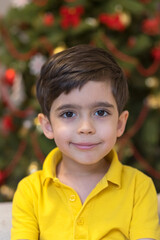 Cute boy on christmas background. Family christmas concept. Little child. Smile boy. Happy new year