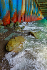Under the old rusty bridge