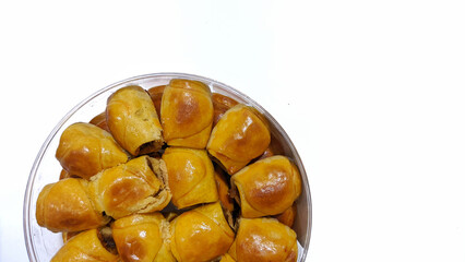 Nastar is a dry cookie filled with pineapple jam isolated on a white background. Selective focus
