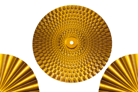 Modern wall decoration made of gold metal in the shape of a round plate. Decoration isolated on transparent or white background