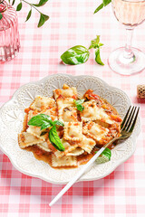 ravioli in tomato sauce with basil