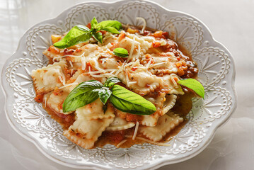 ravioli in tomato sauce with basil