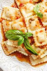ravioli in tomato sauce with basil