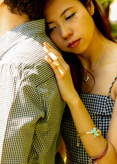 Fototapeta premium woman leaning on a man backside