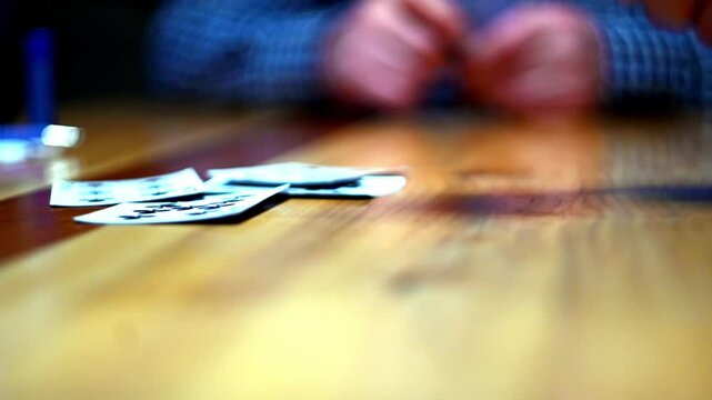 Cinematic close-up stock videos that bring the world of card games to life.  Expertly shot with attention to detail, these clips feature dramatic lighting and smooth camera movements.