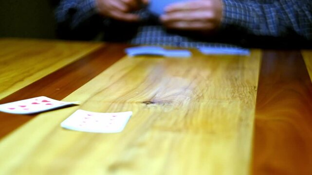 Cinematic close-up stock videos that bring the world of card games to life.  Expertly shot with attention to detail, these clips feature dramatic lighting and smooth camera movements.
