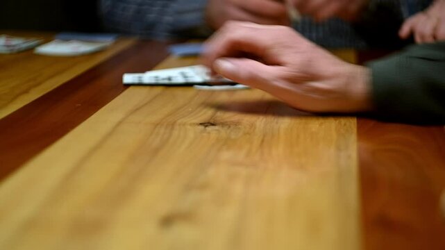 Cinematic close-up stock videos that bring the world of card games to life.  Expertly shot with attention to detail, these clips feature dramatic lighting and smooth camera movements.