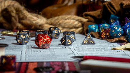 Roleplaying Game Dice And Character Sheets On Table