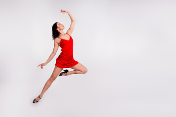 Full length photo of fancy graceful lady wear red dress dancing bachata erotic moves blank space isolated white color background
