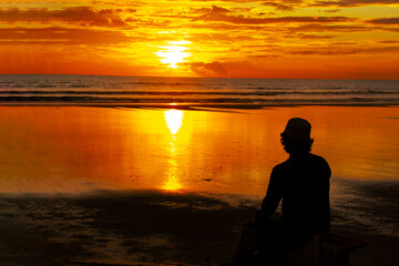Silhouette of a person on the beach