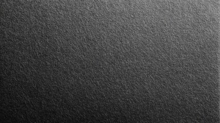 Fototapeta premium Matte Black and Dark Gray Paper Texture with Subtle Dimension for Artistic Background or Design Element in Various Projects