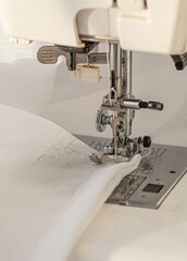 Sewing Machine Close-Up Stitching White Sheer Fabric