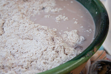 Pozol is a traditional Mexican drink made from corn dough that regularly includes cocoa and can be fermented.