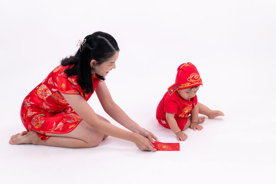 Portrait of mother and son in Chinese New Year celebration clothes