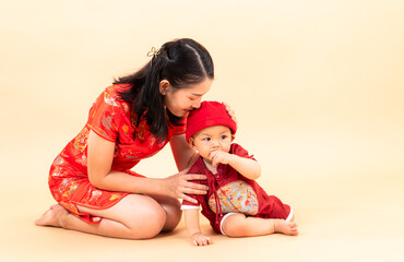 Portrait of mother and son in Chinese New Year celebration clothes