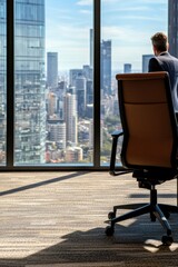 A businessman stands by a large window in a modern office, overlooking a bustling city skyline filled with high-rise buildings.
