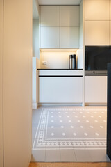 Fototapeta premium minimalistic perspective of a bright modern luxury clean kitchen