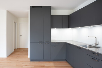 minimalistic perspective of a bright modern luxury clean kitchen