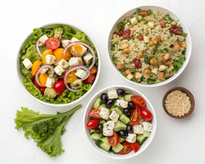 Top view of a variety of fresh salads, including Caesar, Greek, and quinoa salad, isolated on white background, highlighting the fresh vegetables and colorful ingredients.