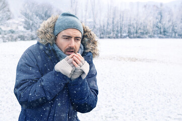 One man sensitive to cold freezing outdoor in the snow