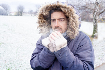 One man suffering and shivering because of cold weather