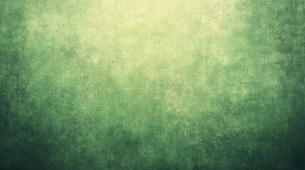 Obraz premium Textured vintage green background with a grunge effect suitable for graphic design and artistic projects.