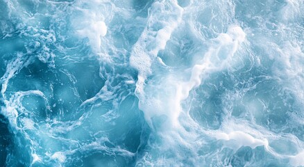 Fototapeta premium Dynamic ocean waves with white foam in turquoise sea