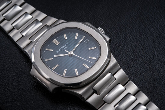 Patek Philippe watch, Nautilus model. Quartz watch, steel case on dark background. Milan. Italy_September 10_2024