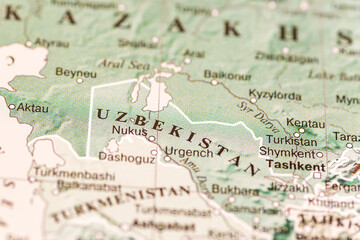 World map. Uzbekistan on the geographical map, world tourism, destination. Political map close-up. Photo.