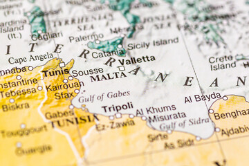World map.Malta on the geographical map, world tourism, destination. Political map close-up photo.