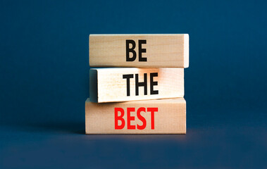 Motivational be the best symbol. Concept words Be the best on beautiful wooden blocks. Beautiful grey table grey background. Business motivational be the best concept. Copy space.