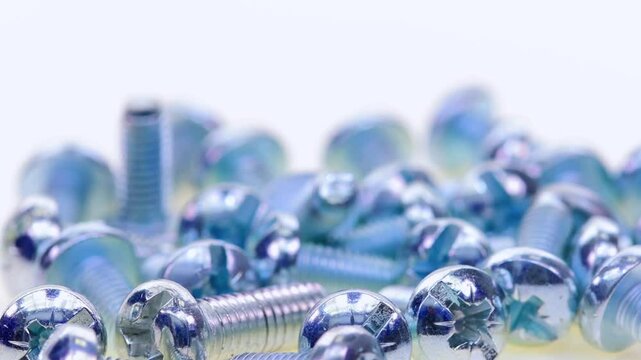 Metal screws for fastening equipment. Soft focus. Close-up. 
