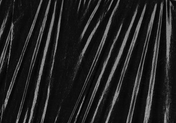 Black transparent plastic wrap texture overlay background. Realistic plastic for poster design and photo overlay effect. Wrinkled paper surface pattern for graphic design sources and element mockup.