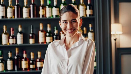 Stylish bartender serving drinks in a trendy bar
