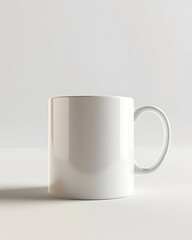 Obraz premium Ceramic mug set against a minimalist background highlighting its clean design and potential for customization