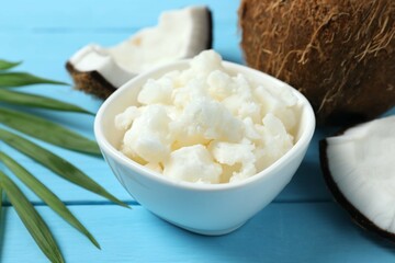 Bowl of coconut oil on table