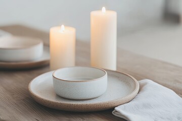 close-up of rustic wooden table set with ceramic plates linen napkins and candles glowing softly