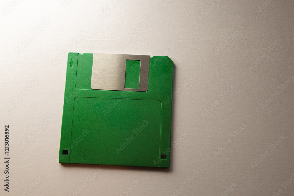 Poster green floppy disk hard drive hd diskette for storage information on retro computers isolated on an o