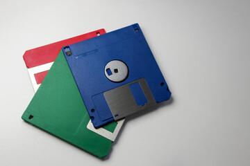 several floppy disks hard drive hd diskettes for storage information on retro computers isolated on...